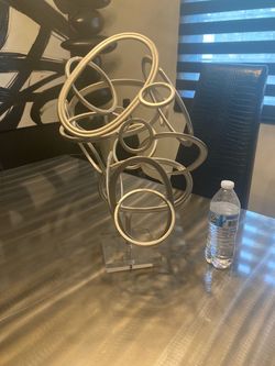 Gorgeous silver sculpture with acrylic base. Willowick.