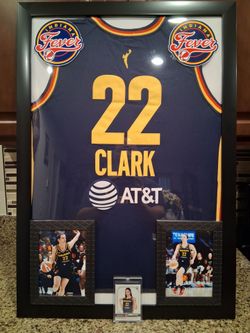 CATLIN CLARK OF THE INDIANA FEVER,STITCHED, BRANDED,AUTHENTIC FRAMED JERSEY WITH TRADING CARD.