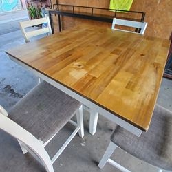 4 chairs and a table