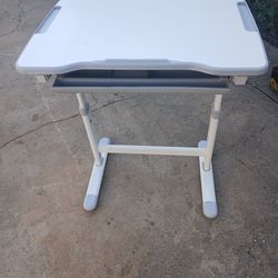 Kids adjustable height desk/art desk