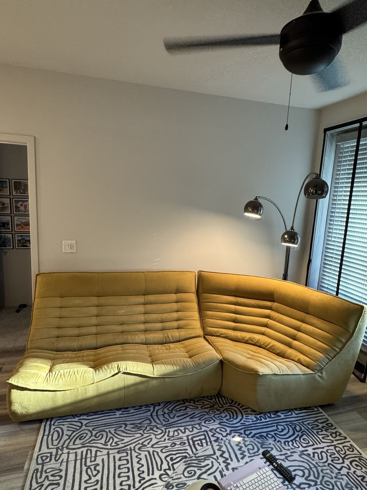 Diego two-piece sectional sofa in mustard color by Scandinavian Designs company.