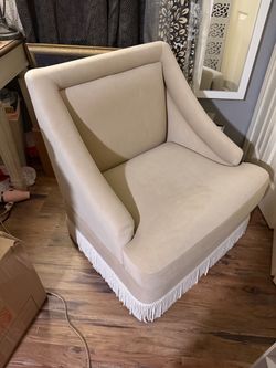 Cream Upholstered Accent Chair with Fringe