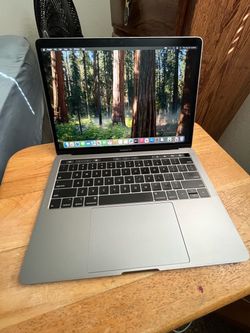 Mac book pro laptop touchbar new battery 13” works great