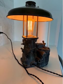 Lamp made out of small engine and car parts