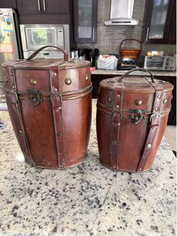 Pair of brown leather hat boxes