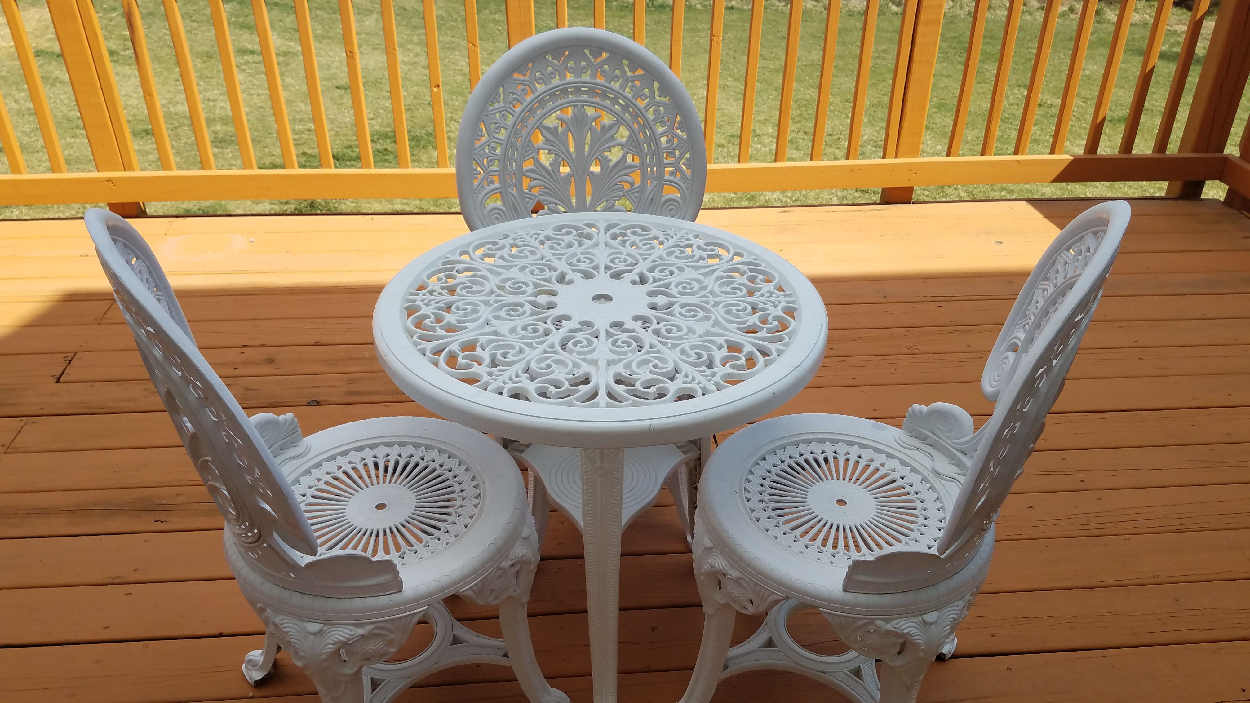 PATIO TEA TABLE WITH THREE CHAIRS