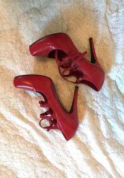 Size 5 or 6 red pumps