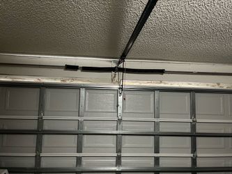 Garage Door Opener Broken Spring Off Track Replace Adjustment And Parts