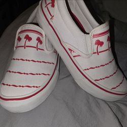 Vans White Canvas Slip-On Sneakers with In and Out print
