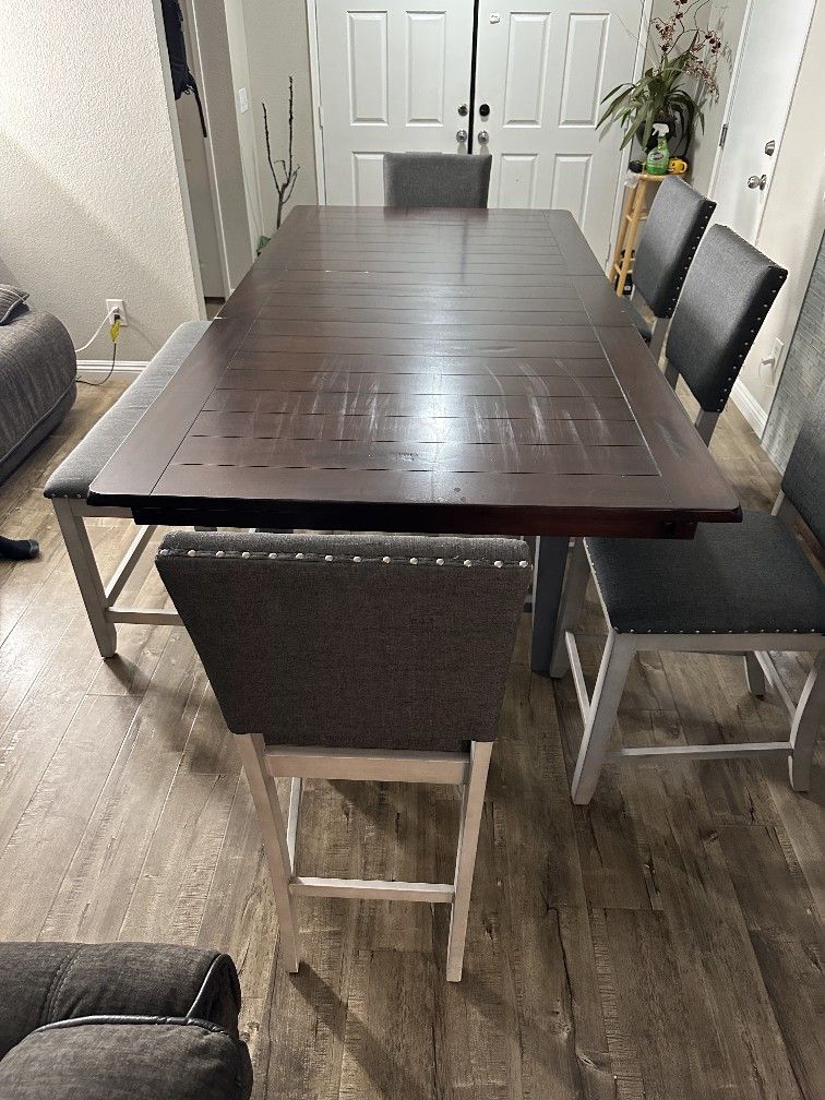Dinning Table ,chairs and a Bench