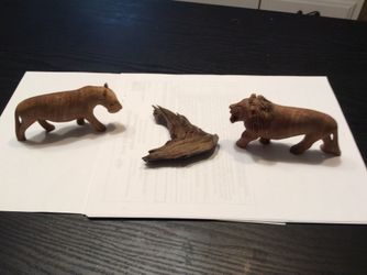 Hand carved wood lions and draft wood