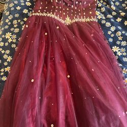 Strapless burgundy sequin tulle gown