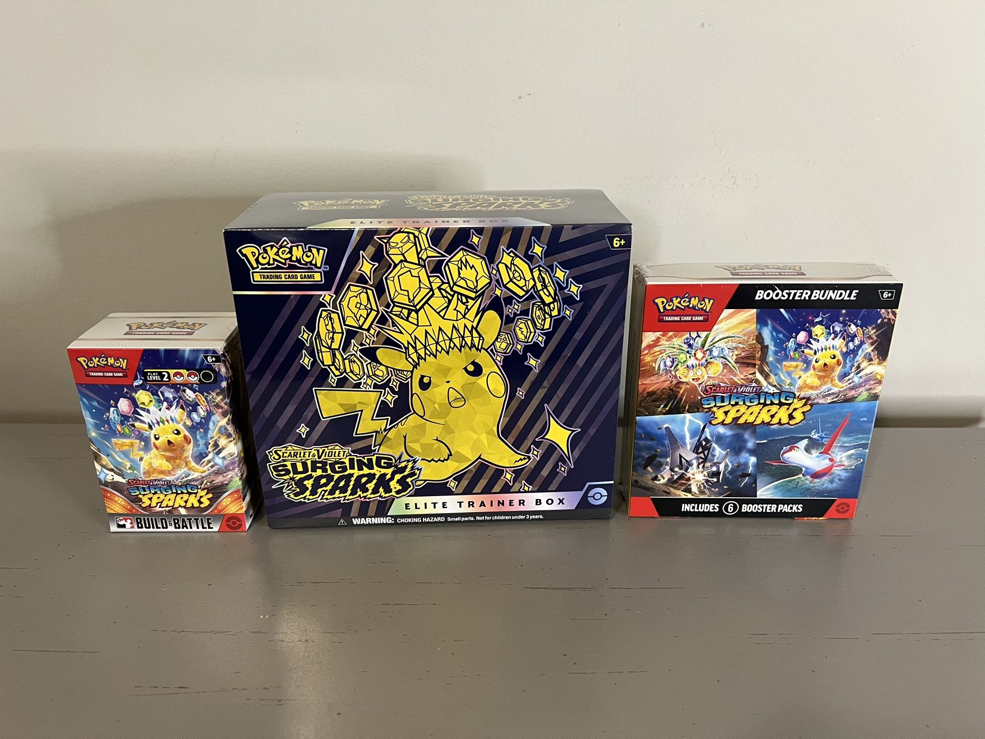 Pokémon TCG Surging Sparks Product’s Lot (ETB, Booster Bundle, Build&Battle)