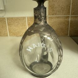 Haig's decanter with a sterling silver overlay 