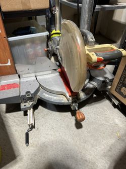 Rigid dual bevel miter saw