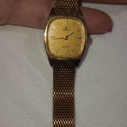 Vintage Gold Lorus Watch With A Singapore Dial 