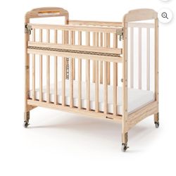 Foundations Serenity SafeReach Compact Wood Crib with 3" Mattress, Drop Gate, Casters, Natural