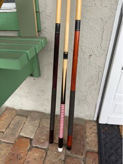 3 Pool Sticks and Balls