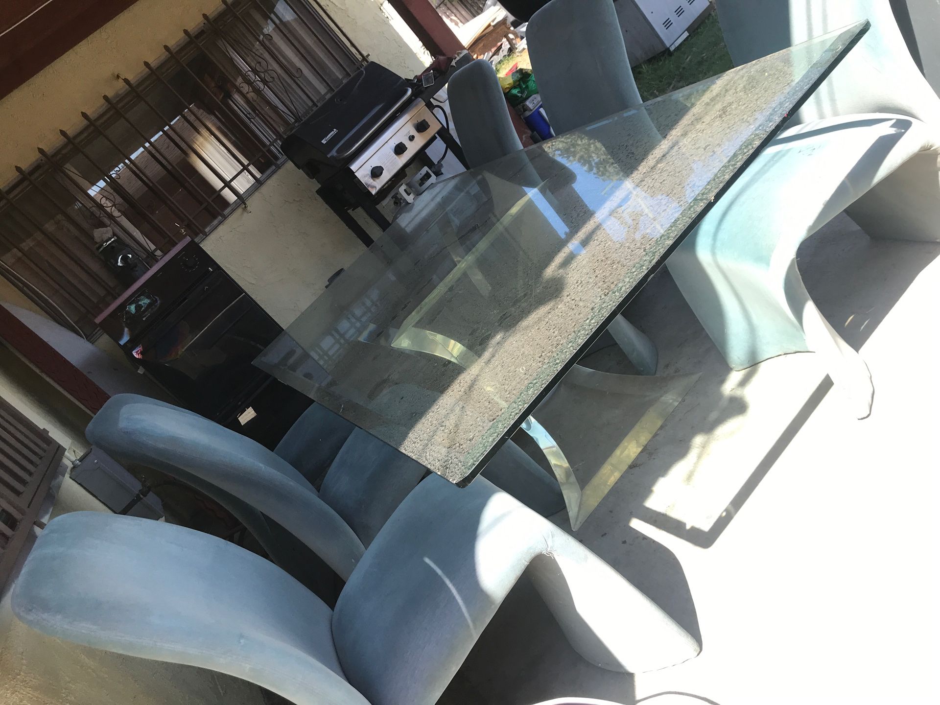 Large Glass Table w/ Blue Velvet Chairs