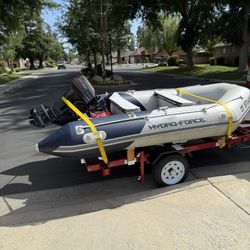 Inflatable Boat 12’ With 9.9 Hp Motor 2cycle And Folding Trailer 