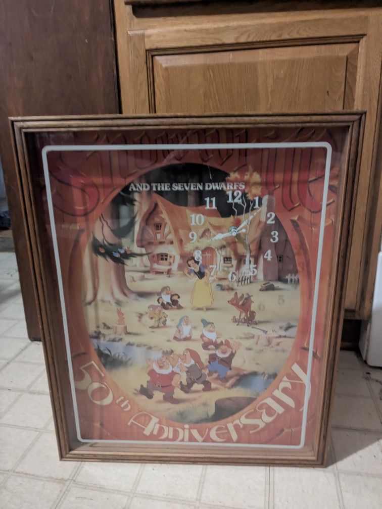Snow White And The Seven Dwarfs 50th Anniversary Poster Clock In A Frame With Glass