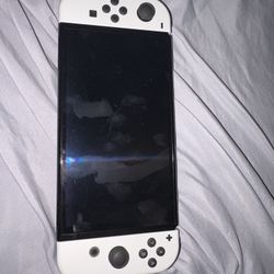 Oled Nintendo Switch With The Controllers And The Tv Hookup 