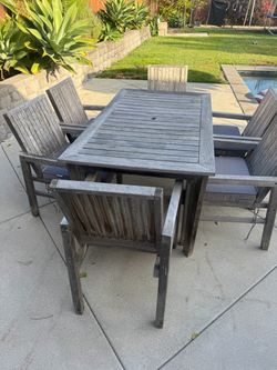 Outdoor teak table and 6 chairs