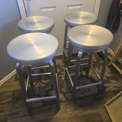 Crate and Barrel brushed aluminum Backless spin bar stools 30"X14 set of 4