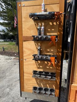 Wall-Mounted Caulk Gun and Tube Holder Racks