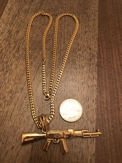 Gun pendant with Cuban link chain necklace