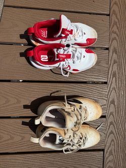 Two Pairs of Baseball Cleats Nike and New Balance