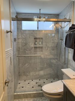 Frameless shower glass