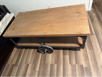 Rustic brown coffee table with wheels