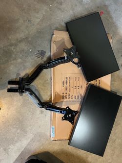 Dual Dell monitors with dual monitor arms