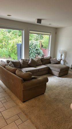Large sectional couch with full-size bed