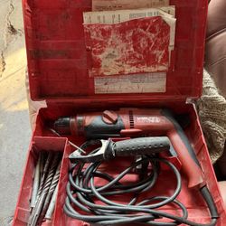 Heavy-duty Hilti TE 2 rotary hammer drill, great for concrete, masonry, and general construction work. Reliable corded model with SDS chuck system for