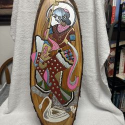 Hindu Goddess Saraswarti On A Slice Of Wood