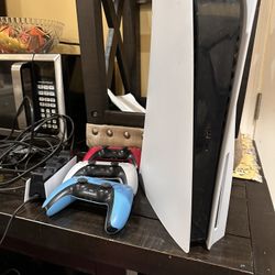 Playstation Five With Three Controllers