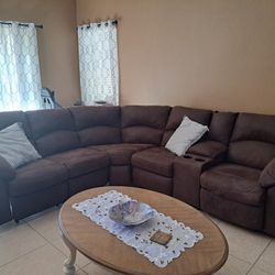 L Shape Couch With Recliners On Each End.