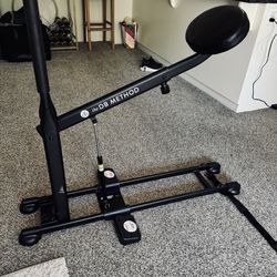 The DB Method Home Squat Machine