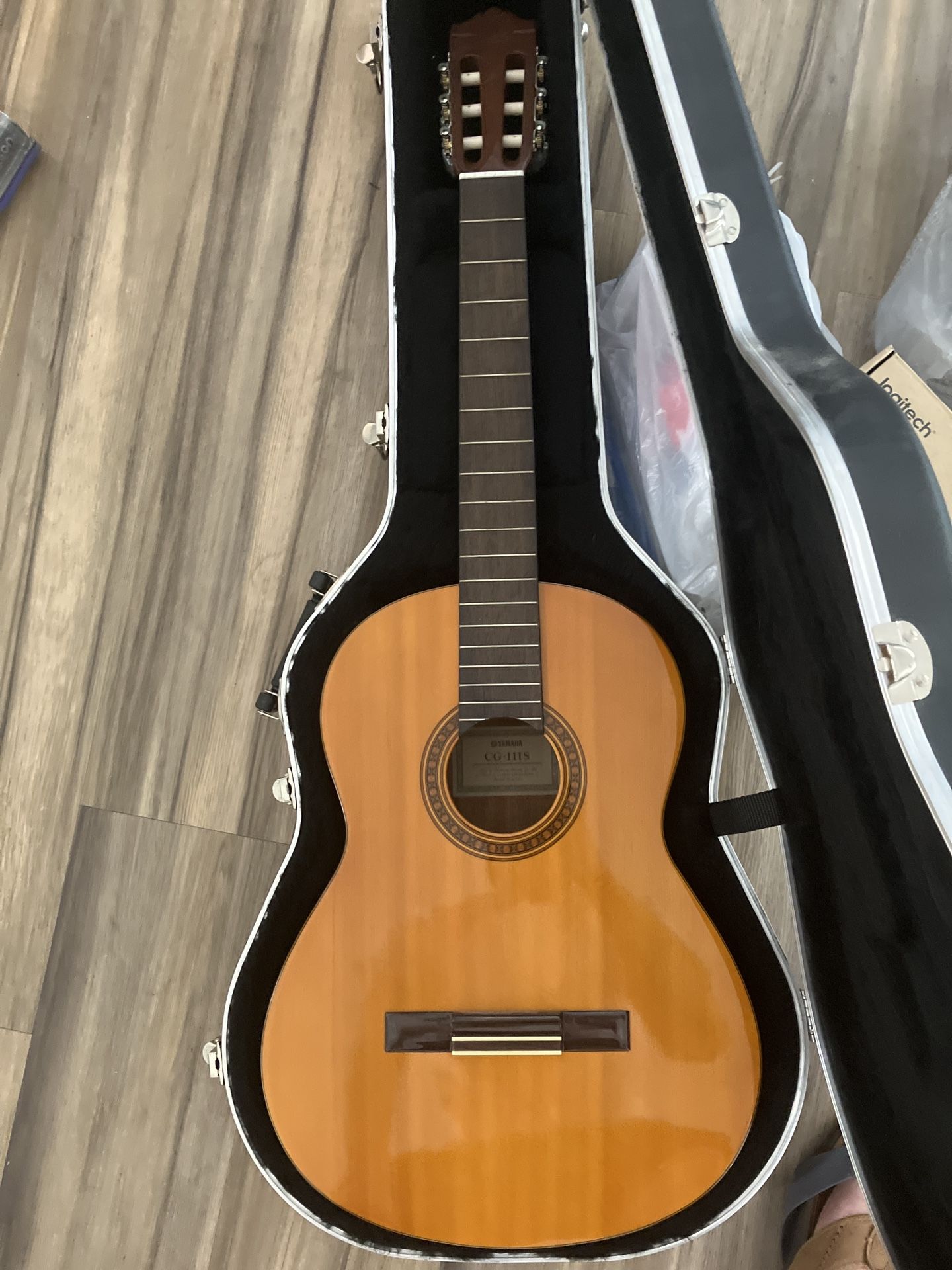 Yamaha CG‑111S classical guitar in a hard case