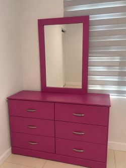 Pink dresser and mirror