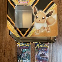 Lot Tin And two sealed Pokémon TCG packs - one eavh of Sword and Shield & Sun and Moon base set Booster Packs. Sun and Moon base set Booster Packs