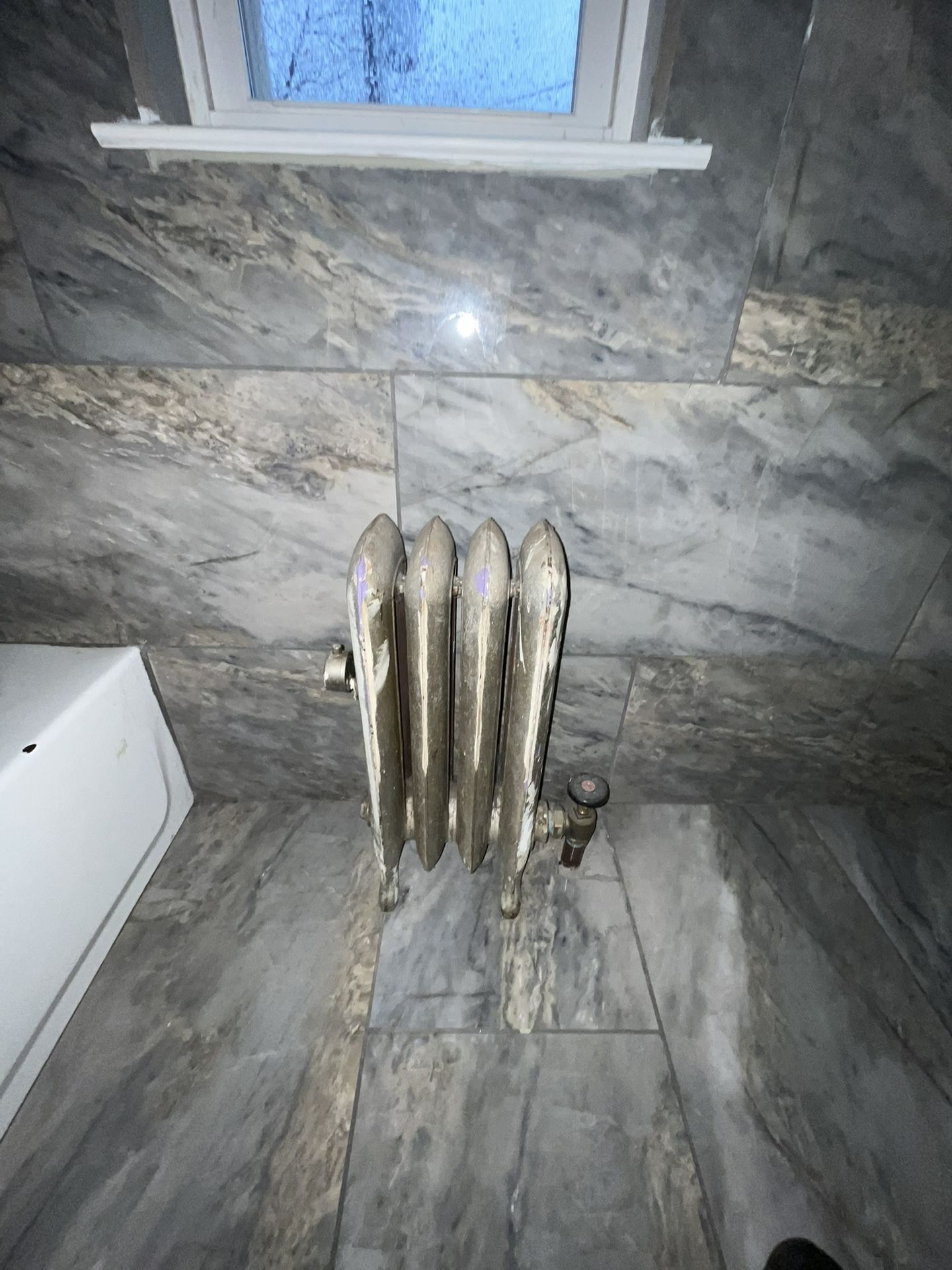 Cast Iron Hitting Radiator