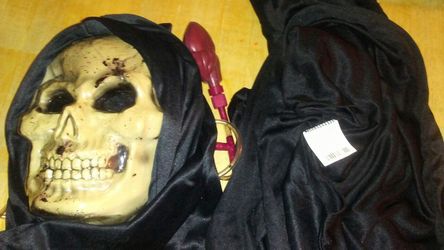 Scary mask (with blood pumper) & robe.