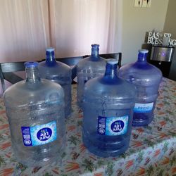 6- 5 Gallon Water Bottles 