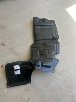Prius C engine splash shield