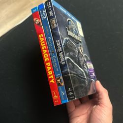 Sausage Party. Jurassic World And Pirates Of The Caribbean Blu Ray Movies With Slipcovers 