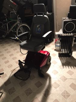 Black and red powerchair 200 or trade