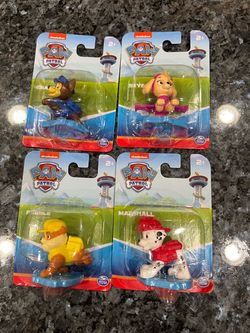 Nickelodeon Paw Patrol lot of 4 vinyl / plastic figures / Cake Topper. Can be used as Cake Toppers. Chase, Marshall. Rubber and Skye. Size approxim